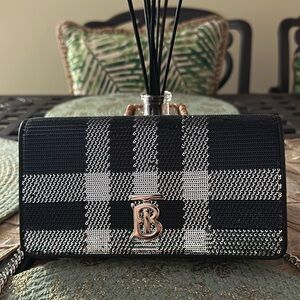Brand new Burberry wallet on a chain.